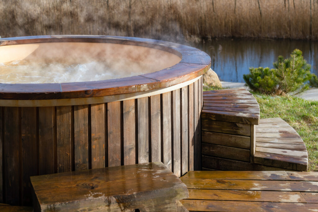 Wood hot tub displayed outside 